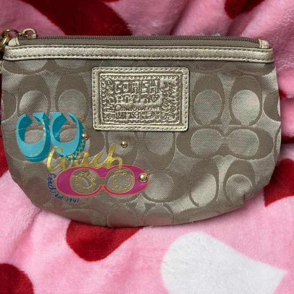 Coach Handbags - Coach Poppy Tan Wristlet with Gold Accents